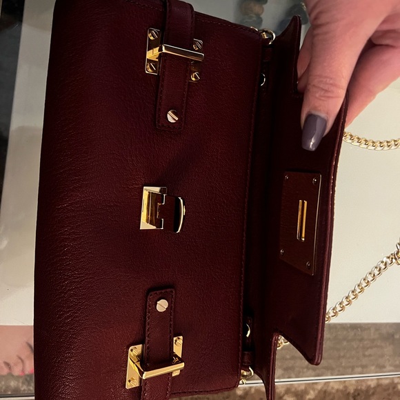 Burgundy Micheal Kors purse in mint condition . - Picture 2 of 5